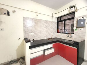 Kitchen in 2 BHK Apartment at Kolte Patil Margosa Heights, Mohammadwadi – for Rent