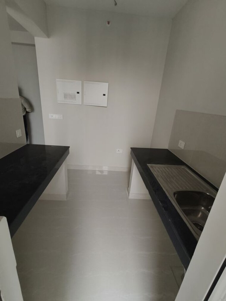 Kitchen, eldeco-live-by-the-greens 2 Bedroom 1137 Sq.Ft. Apartment In Sector 150 Noida 10602679
