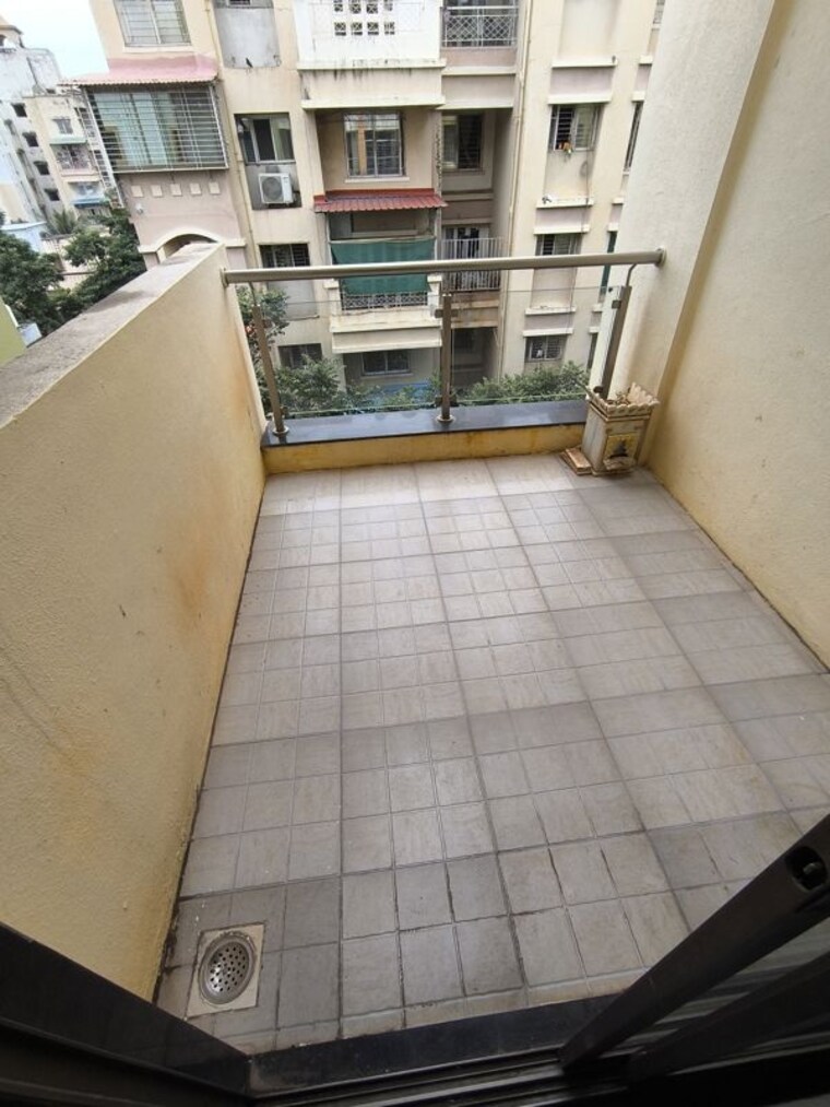 Balcony, creative-eclectica-homes 2 Bedroom 800 Sq.Ft. Apartment In Pimple Saudagar Pune 10602697