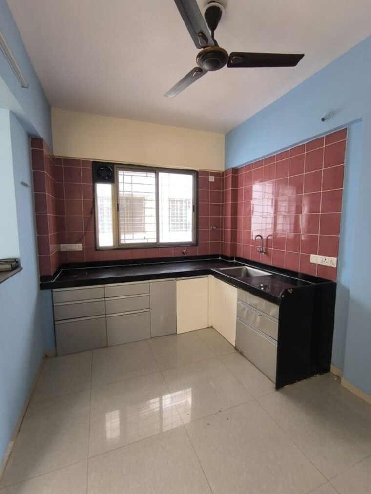 Kitchen, creative-eclectica-homes 2 Bedroom 800 Sq.Ft. Apartment In Pimple Saudagar Pune 10602697