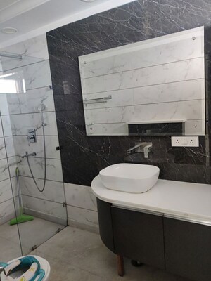 Bathroom in 3 BHK Apartment at Mahindra Luminare, Sector 59 – for Rent