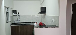Kitchen in 3 BHK Apartment at Gera World of Joy, Kharadi – for Sale