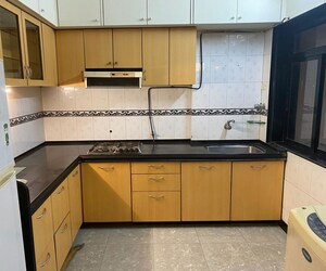Kitchen in 2 BHK Apartment at Sky Pan Apartment, Andheri West – for Rent