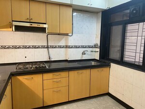 Kitchen in 2 BHK Apartment at Sky Pan Apartment, Andheri West – for Rent