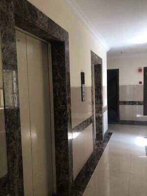 Building Lobby in 2 BHK Apartment at Raheja Tipco Heights, Malad East – for Rent