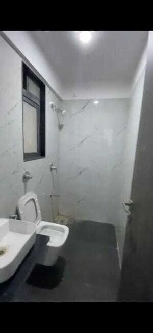 Bathroom in 2 BHK Apartment at Dev Leo Tower, Oshiwara – for Rent