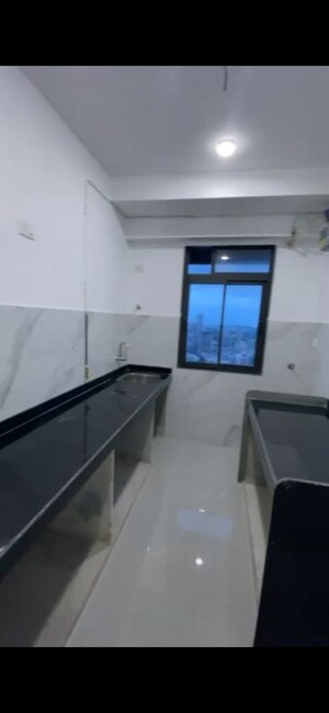 Kitchen in 2 BHK Apartment at Dev Leo Tower, Oshiwara – for Rent
