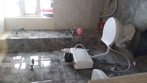 Bathroom in 1 BHK Apartment at Auric City Homes, Sector 82 – for Rent