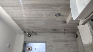 Bathroom in 2.5 BHK Apartment at Forishna Nav Chetna, Santacruz West – for Sale
