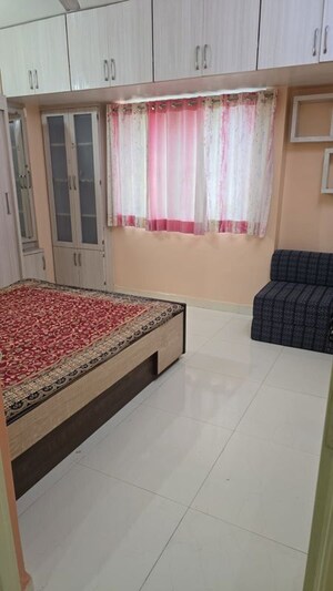Bedroom in 2 BHK Apartment at D S Shivdarshan, Dhanori – for Rent