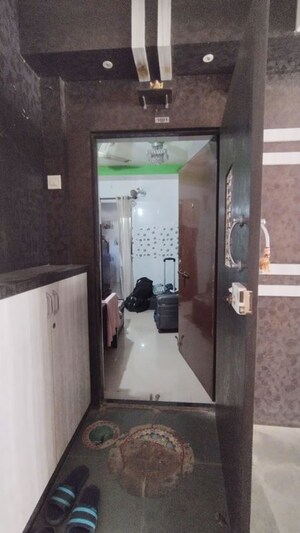 Living Room in 1 BHK Apartment at New Mhada Tower, Malad West – for Rent