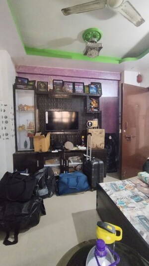 Living Room in 1 BHK Apartment at New Mhada Tower, Malad West – for Rent