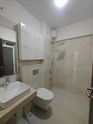 Bathroom in 3 BHK Apartment at Seawoods Sector 40 – for Rent