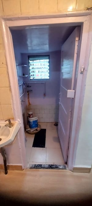 Bathroom in 2 BHK Apartment at Adinath CHS, Borivali West – for Rent