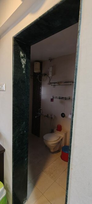 Bathroom in 3 BHK Apartment at Senapati Bapat Road – for Rent