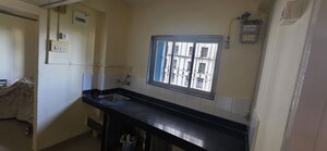 Kitchen in 1 BHK Apartment at New Mhada Tower, Malad West – for Sale