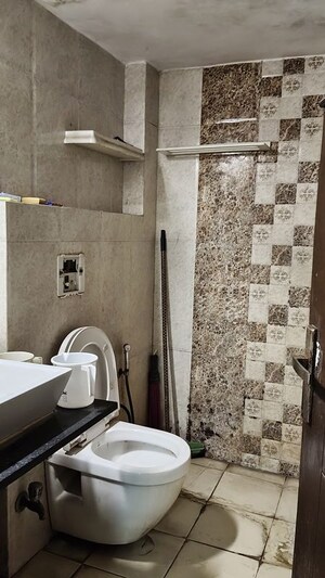 Bathroom in 2 BHK Apartment at Arun Vihar Sector 37, Sector 37 – for Rent