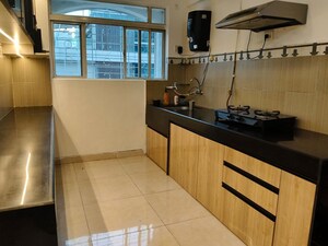 Kitchen in 2 BHK Apartment at Karia Konark Campus, Viman Nagar – for Rent