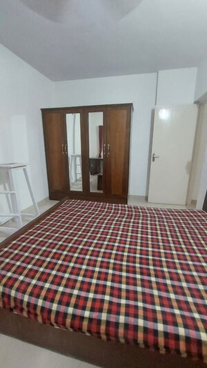 Bedroom in 1 BHK Apartment at Satellite Garden, Goregaon East – for Rent