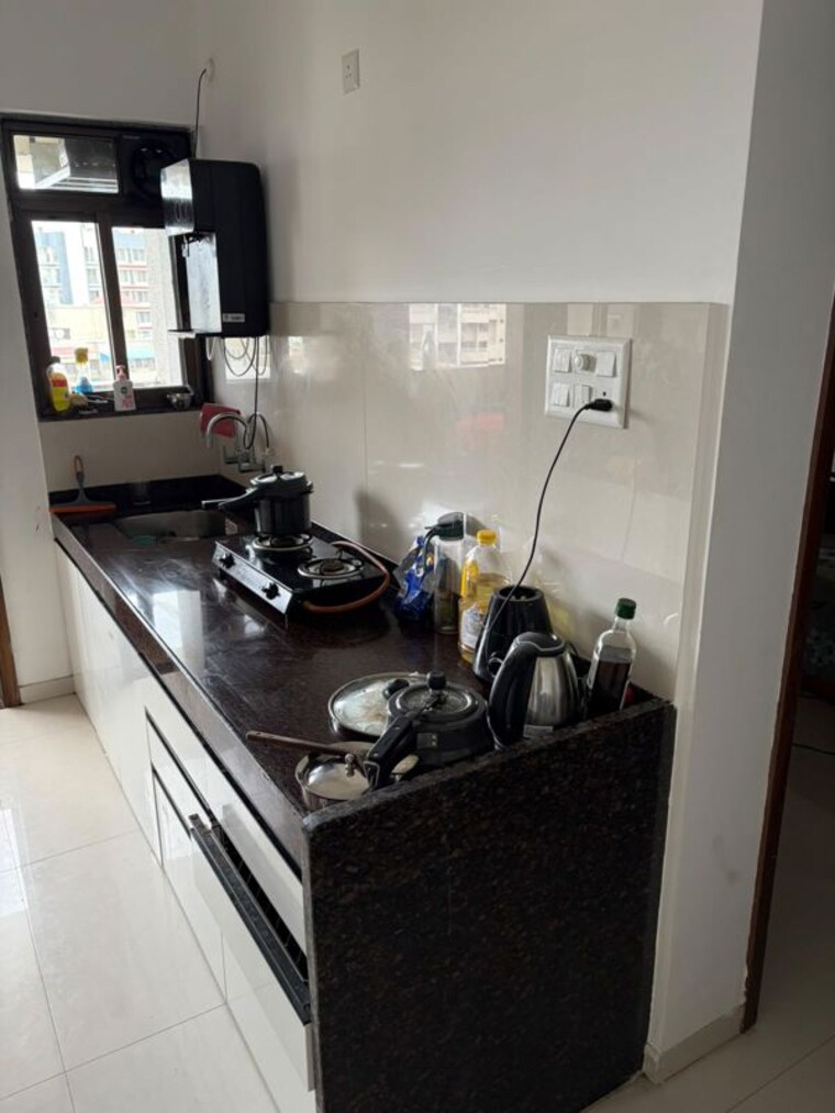 Kitchen, arv-uthville 2 Bedroom 850 Sq.Ft. Apartment In Kharadi Pune 10603291
