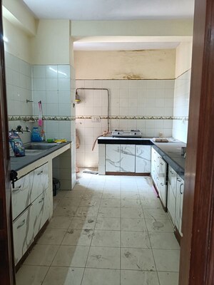 Kitchen in 4 BHK Apartment at Vasundhara Enclave – for Sale