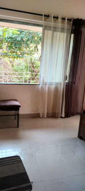 Living Room in 2 BHK Apartment at Garden View Apartment, Goregaon East – for Rent