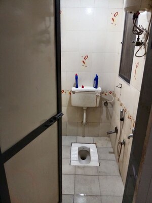 Bathroom in Studio Apartment at New Mhada Tower, Malad West – for Rent