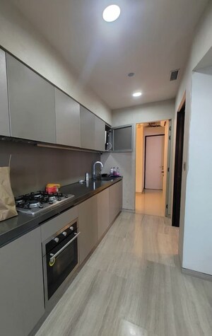 Kitchen in 2 BHK Apartment at Paradigm Green Acrres, Bandra West – for Rent