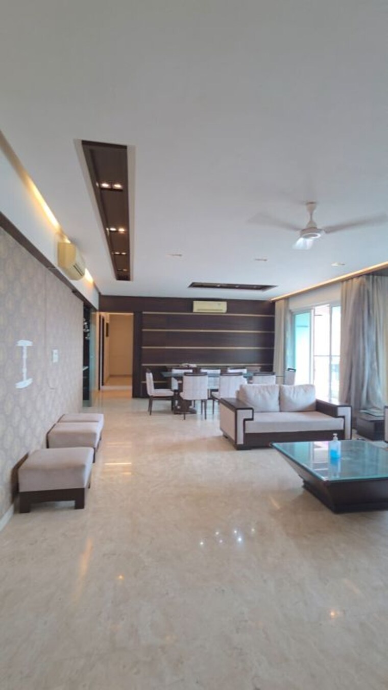 Living Room, hiranandani-meadows 5 Bedroom 5000 Sq.Ft. Penthouse In Manpada Thane 10603414