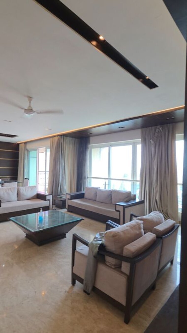 Living Room, hiranandani-meadows 5 Bedroom 5000 Sq.Ft. Penthouse In Manpada Thane 10603414