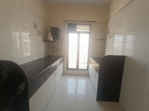 Kitchen in 1 BHK Apartment at Prithvi Regency, Tembhode – for Sale