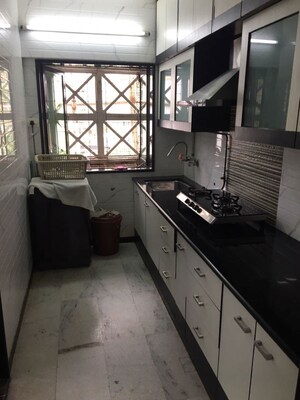 Kitchen in 2 BHK Apartment at Dheeraj Solitaire, Malad West – for Rent