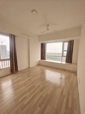 Room in 2 BHK Apartment at The Wadhwa Palm Beach Residency, Nerul Sector 4 – for Rent