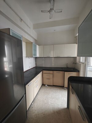 Kitchen in 2 BHK Apartment at The Wadhwa Palm Beach Residency, Nerul Sector 4 – for Rent