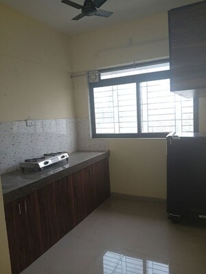 Kitchen in 1 BHK Apartment at Shivsandesh CHS, Worli – for Rent