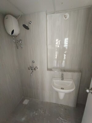 Bathroom in 1 BHK Apartment at Runwal Gardens, Dombivli East – for Rent