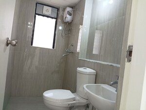 Bathroom in 2 BHK Apartment at Runwal Gardens, Dombivli East – for Sale