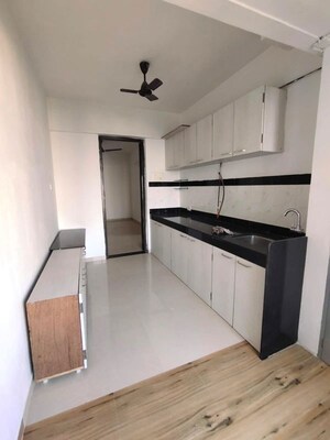 Kitchen in 2 BHK Apartment at Raj Infinia, Malad West – for Sale