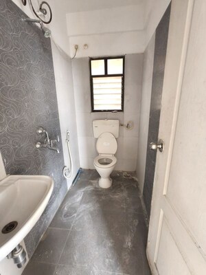 Bathroom in 2 BHK Apartment at Kolte Patil Margosa Heights, Mohammadwadi – for Sale