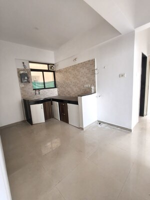 Kitchen in 2 BHK Apartment at Kolte Patil Margosa Heights, Mohammadwadi – for Sale