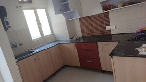 Kitchen in 2.5 BHK Apartment at Aims Golf City, Sector 75 – for Rent