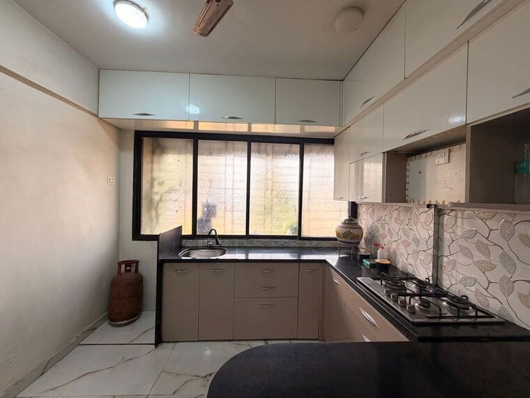 Kitchen, trinity-apartment-uthalsar 2 Bedroom 610 Sq.Ft. Apartment In Uthalsar Thane 10603757