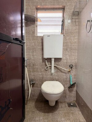 Bathroom in 2 BHK Apartment at Trinity Apartment Uthalsar, Uthalsar – for Rent