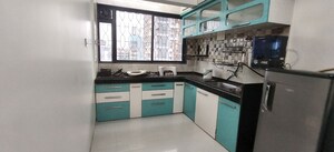 Kitchen in 2 BHK Apartment at Raj Vaikunth CHS, Ulwe Sector 3 – for Rent
