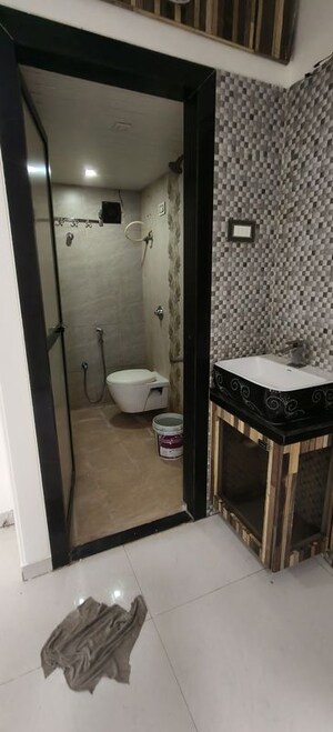 Bathroom in 2 BHK Apartment at Raj Vaikunth CHS, Ulwe Sector 3 – for Rent