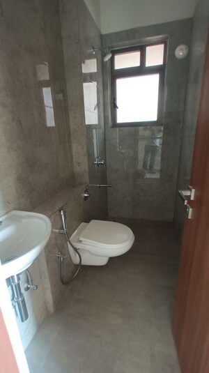 Bathroom in 2 BHK Apartment at Sheth Auris Bliss, Malad West – for Rent