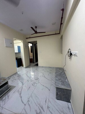 Kitchen in 2 BHK Apartment at Raymond Ten X Habitat, Pokhran Road No Two – for Rent