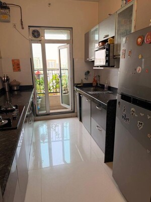 Kitchen in 2 BHK Apartment at Rustomjee Azziano Wing D, Thane West – for Rent