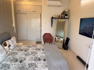 Living Room in 2 BHK Apartment at Rustomjee Azziano Wing D, Thane West – for Rent