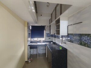 Kitchen in 1 BHK Apartment at Shreeji Plaza, Malad West – for Rent